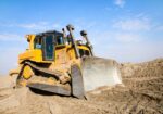 Bulldozer D7 et Komatsu